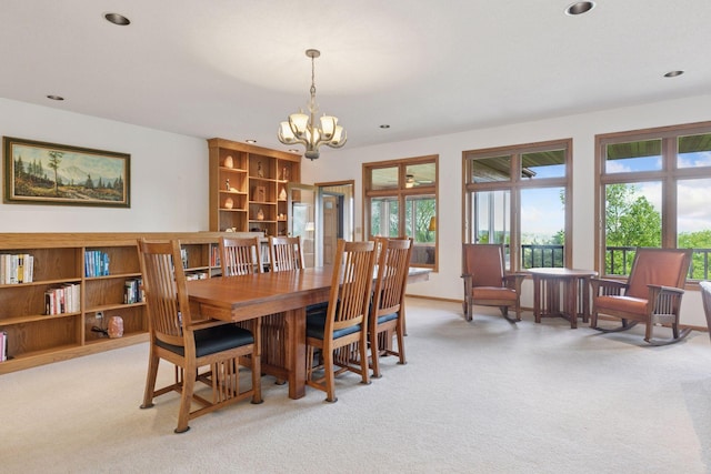 32875 Stanton Trl, Cannon Falls, MN 55009 - dining area with light colored carpet, a chandelier, recessed lighting, and baseboards