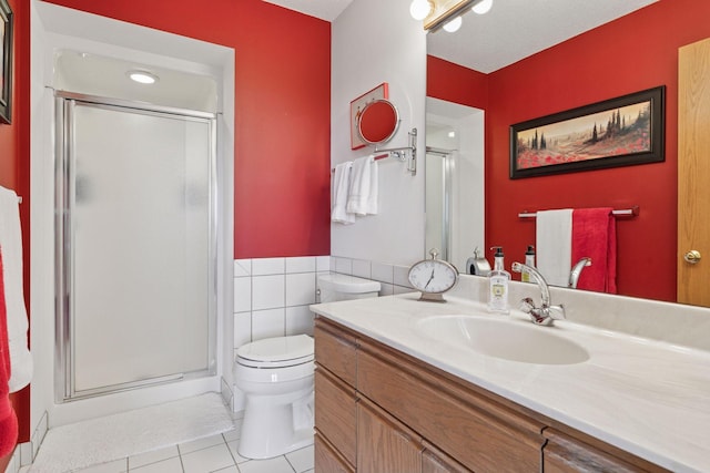 32875 Stanton Trl, Cannon Falls, MN 55009 - bathroom featuring tile patterned floors, toilet, a shower stall, and vanity