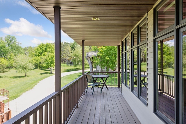 32875 Stanton Trl, Cannon Falls, MN 55009 - wooden porch featuring a yard