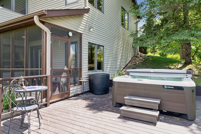 32875 Stanton Trl, Cannon Falls, MN 55009 - wooden deck featuring a hot tub and a sunroom