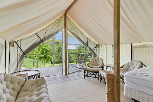 32875 Stanton Trl, Cannon Falls, MN 55009 - bedroom featuring access to outside, wood finished floors, and vaulted ceiling