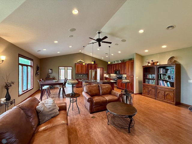 3823 43rd Ave S, Moorhead, MN 56560 - living room with a ceiling fan, lofted ceiling, light wood-style floors, recessed lighting, and baseboards