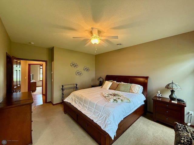 3823 43rd Ave S, Moorhead, MN 56560 - bedroom with light colored carpet, ceiling fan, and baseboards