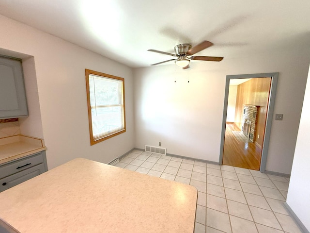 1611 Graydon Ave, Brainerd, MN 56401 - unfurnished bedroom with light tile patterned floors and a ceiling fan