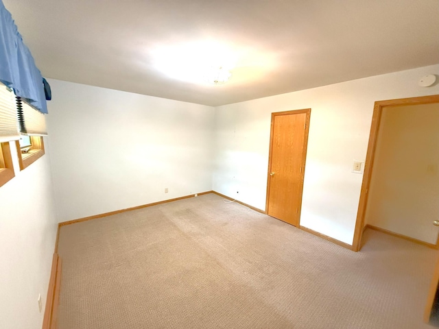 1611 Graydon Ave, Brainerd, MN 56401 - spare room featuring carpet and a smoke detector