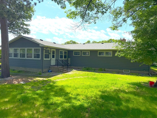 1611 Graydon Ave, Brainerd, MN 56401 - back of property with a yard and a chimney