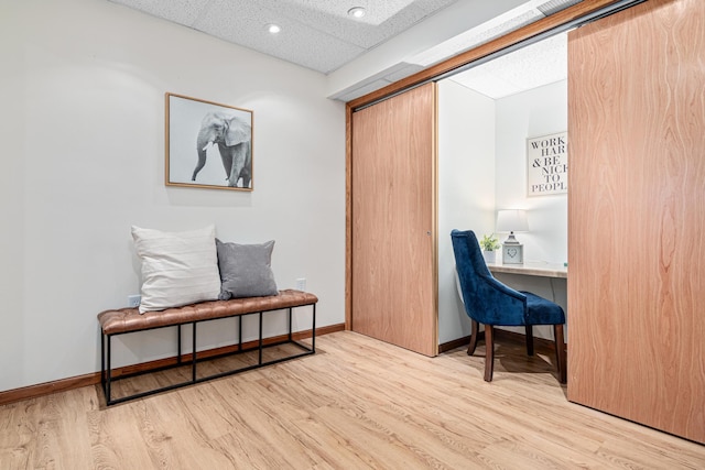 office area featuring wood finished floors, baseboards, and recessed lighting