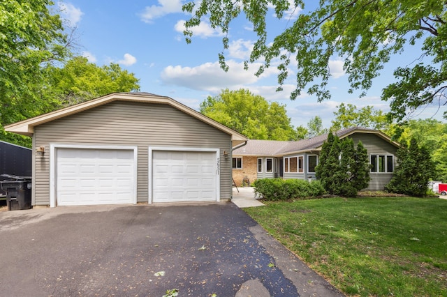 5651 164th Ln NW, Ramsey, MN 55303 - ranch-style home with a front lawn and driveway