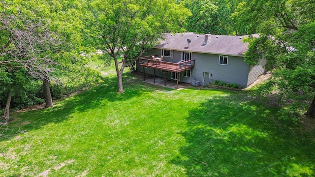 5651 164th Ln NW, Ramsey, MN 55303 - rear view of property featuring a wooden deck, a lawn, and central air condition unit