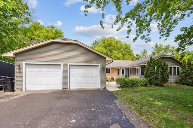 5651 164th Ln NW, Ramsey, MN 55303 - ranch-style house featuring a front lawn and driveway