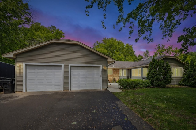 5651 164th Ln NW, Ramsey, MN 55303 - single story home with driveway, a yard, and an attached garage