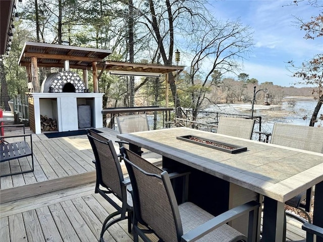 deck with an outdoor fire pit