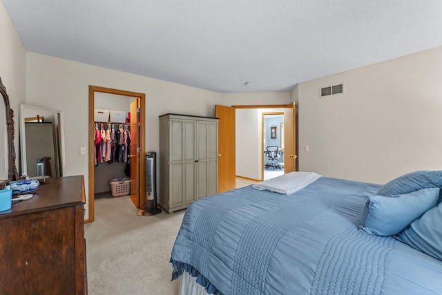2001 Stonepine Ave, Hudson, WI 54016 - bedroom with light colored carpet, a spacious closet, and a closet