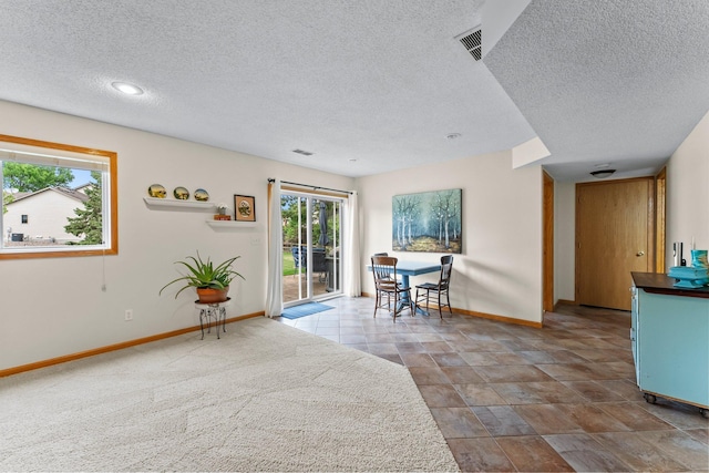 2001 Stonepine Ave, Hudson, WI 54016 - dining area with a textured ceiling and baseboards