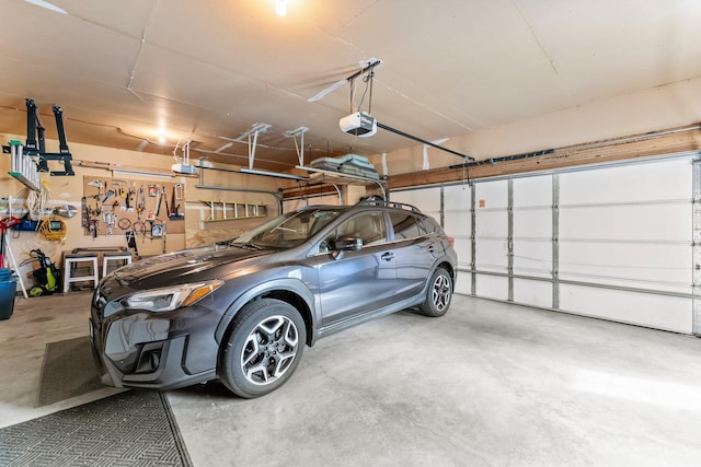 2001 Stonepine Ave, Hudson, WI 54016 - garage with a garage door opener