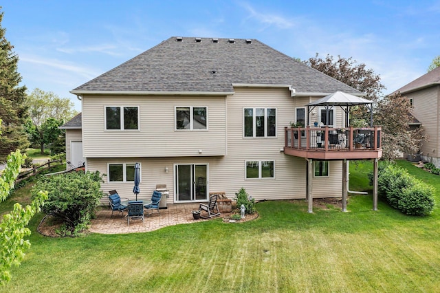 2001 Stonepine Ave, Hudson, WI 54016 - back of house with a gazebo, a shingled roof, and a lawn