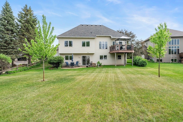 2001 Stonepine Ave, Hudson, WI 54016 - rear view of house with a lawn, a deck, a patio area, and a gazebo