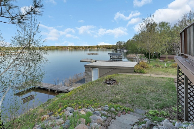 6032 Quinn Ave NW, Annandale, MN 55302 - dock with an outdoor fire pit and a water view