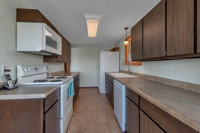 6032 Quinn Ave NW, Annandale, MN 55302 - kitchen with white appliances, a sink, and dark brown cabinets