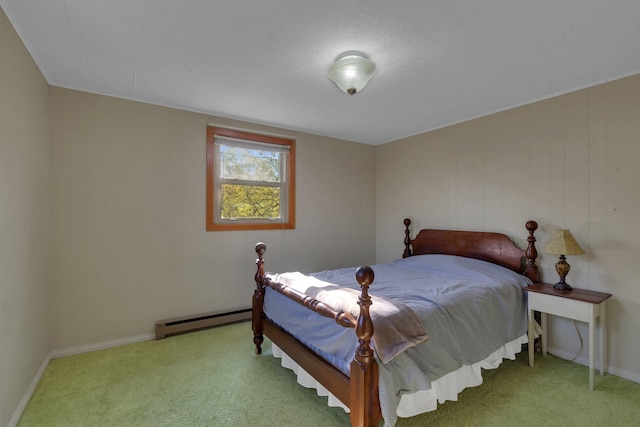 6032 Quinn Ave NW, Annandale, MN 55302 - carpeted bedroom with a baseboard heating unit and baseboards