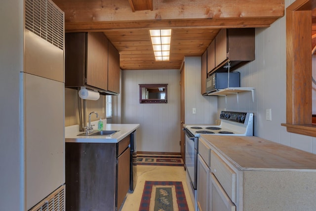 6032 Quinn Ave NW, Annandale, MN 55302 - kitchen with white electric stove, a sink, wood ceiling, and light countertops