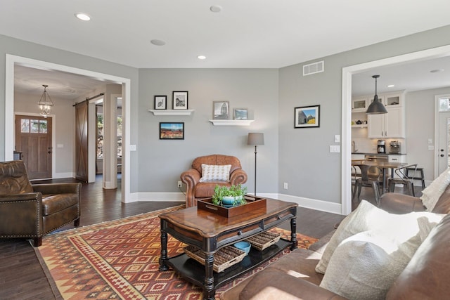 648 Sunset Ln, Mendota Heights, MN 55118 - living room with dark wood finished floors, baseboards, and recessed lighting