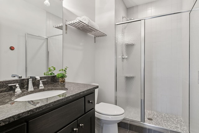 648 Sunset Ln, Mendota Heights, MN 55118 - bathroom with a shower stall, toilet, and vanity