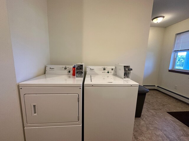 laundry area featuring washing machine and clothes dryer