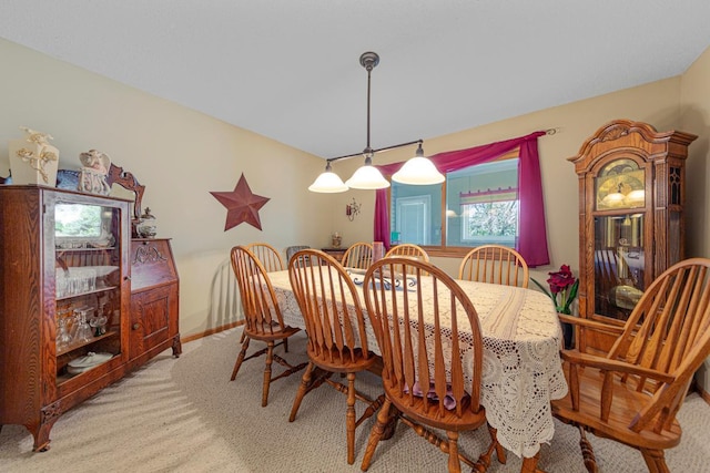 2200 15 1/2 St NW, Faribault, MN 55021 - dining area featuring light colored carpet and baseboards