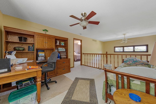 2200 15 1/2 St NW, Faribault, MN 55021 - home office with a ceiling fan and light colored carpet