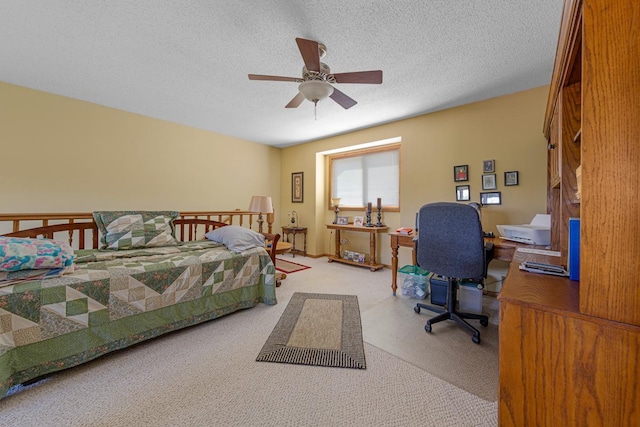2200 15 1/2 St NW, Faribault, MN 55021 - bedroom featuring carpet, a desk, a textured ceiling, and ceiling fan