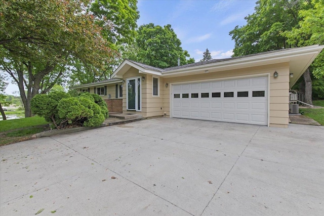 5935 County Road 11, Independence, MN 55359 - single story home with concrete driveway and a garage