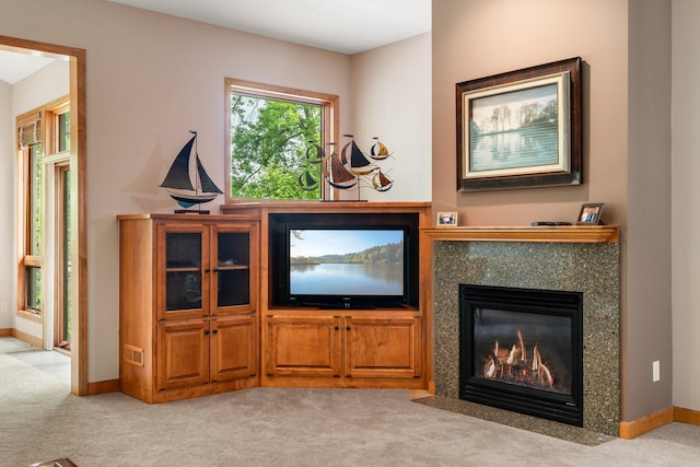 9363 Libby Ln, Eden Prairie, MN 55347 - living area featuring light carpet, baseboards, and a premium fireplace