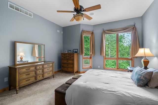 9363 Libby Ln, Eden Prairie, MN 55347 - bedroom with light carpet, baseboards, and a ceiling fan