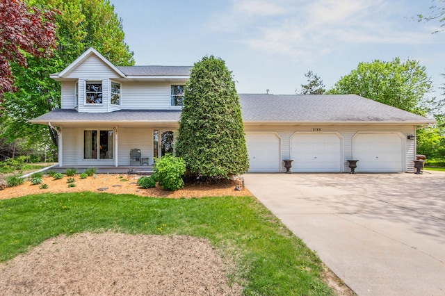 5155 Allen Dr, Woodbury, MN 55129 - view of front of house with driveway, a porch, a shingled roof, and a front lawn