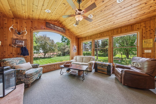 5155 Allen Dr, Woodbury, MN 55129 - living area with lofted ceiling, ceiling fan, wooden walls, wooden ceiling, and carpet floors
