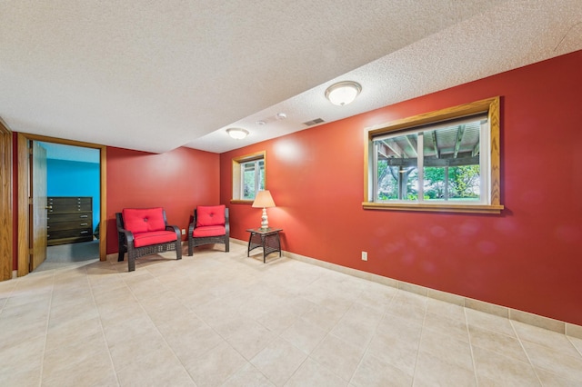 5155 Allen Dr, Woodbury, MN 55129 - sitting room with a textured ceiling and baseboards