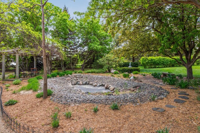 5155 Allen Dr, Woodbury, MN 55129 - view of yard featuring a pergola