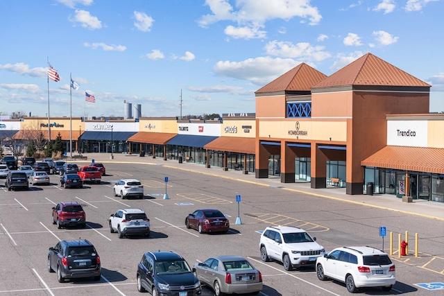 view of commercial property with uncovered parking