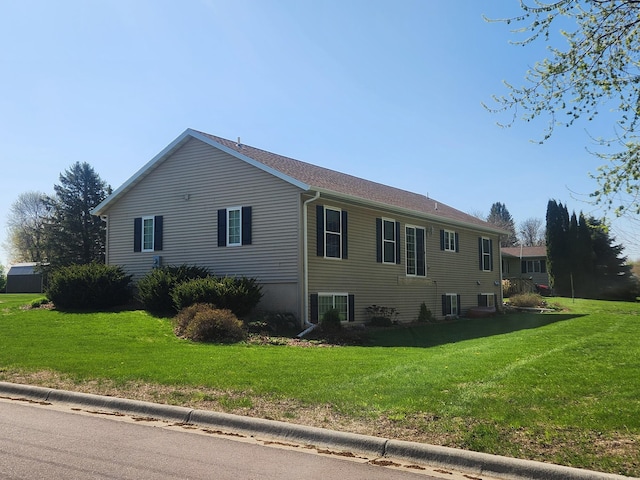 309 Oconnor St, Lakefield, MN 56150 - view of home's exterior with a lawn and central air condition unit