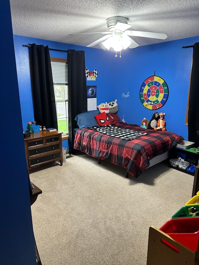 309 Oconnor St, Lakefield, MN 56150 - carpeted bedroom featuring a textured ceiling and ceiling fan