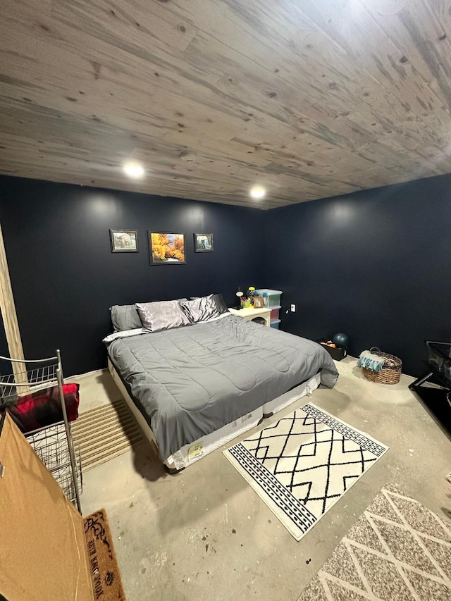 309 Oconnor St, Lakefield, MN 56150 - bedroom featuring unfinished concrete flooring and wooden ceiling