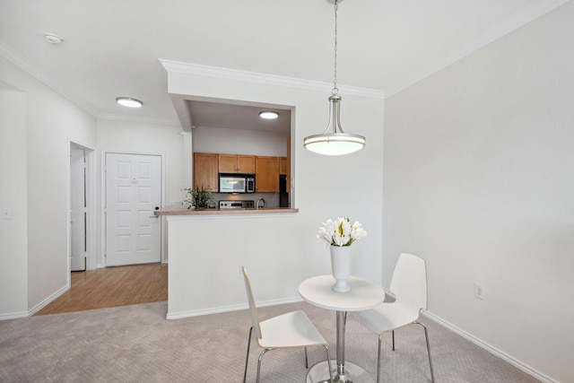13560 Technology Dr Unit 1207, Eden Prairie, MN 55344 - dining room featuring crown molding, light carpet, and baseboards