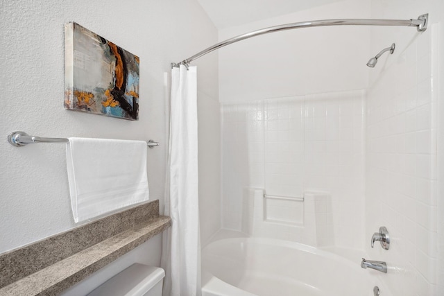13560 Technology Dr Unit 1207, Eden Prairie, MN 55344 - full bath featuring toilet, shower / bath combination with curtain, and a textured wall