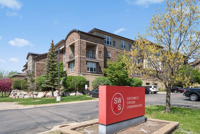 13560 Technology Dr Unit 1207, Eden Prairie, MN 55344 - view of property with uncovered parking