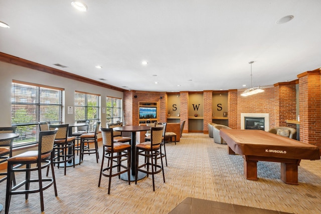 13560 Technology Dr Unit 1207, Eden Prairie, MN 55344 - rec room with a glass covered fireplace, recessed lighting, crown molding, billiards table, and light colored carpet
