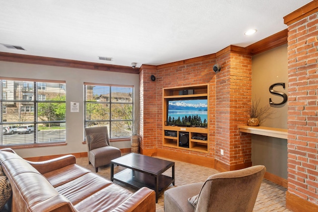 13560 Technology Dr Unit 1207, Eden Prairie, MN 55344 - living area featuring baseboards, crown molding, a fireplace, and wood finished floors