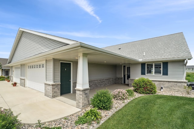 1516 Ranger Dr, Glencoe, MN 55336 - view of front of home featuring brick siding, a garage, concrete driveway, a shingled roof, and a front yard