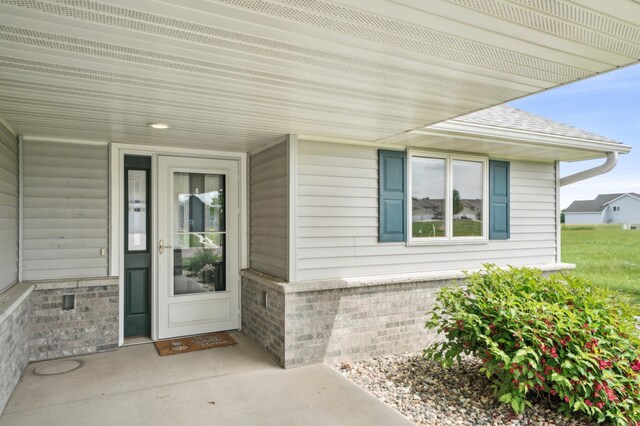 1516 Ranger Dr, Glencoe, MN 55336 - view of exterior entry featuring a shingled roof