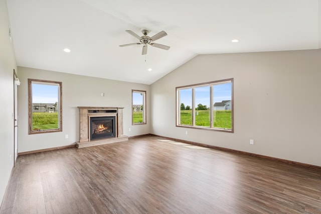 1516 Ranger Dr, Glencoe, MN 55336 - unfurnished living room with healthy amount of natural light, ceiling fan, lofted ceiling, wood finished floors, and recessed lighting